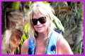 Goldie Hawn Rocks a Red Swimsuit at Age 67, Feeds Dolphins With Kurt Russell